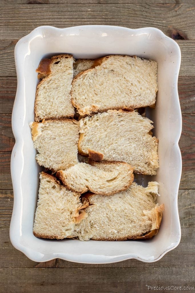 Arranged Slices of bread in baking pan