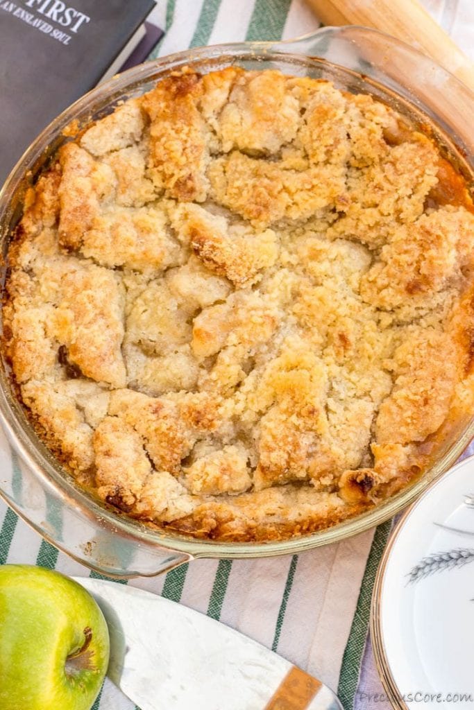 Old-fashioned apple pie in a pie plate.