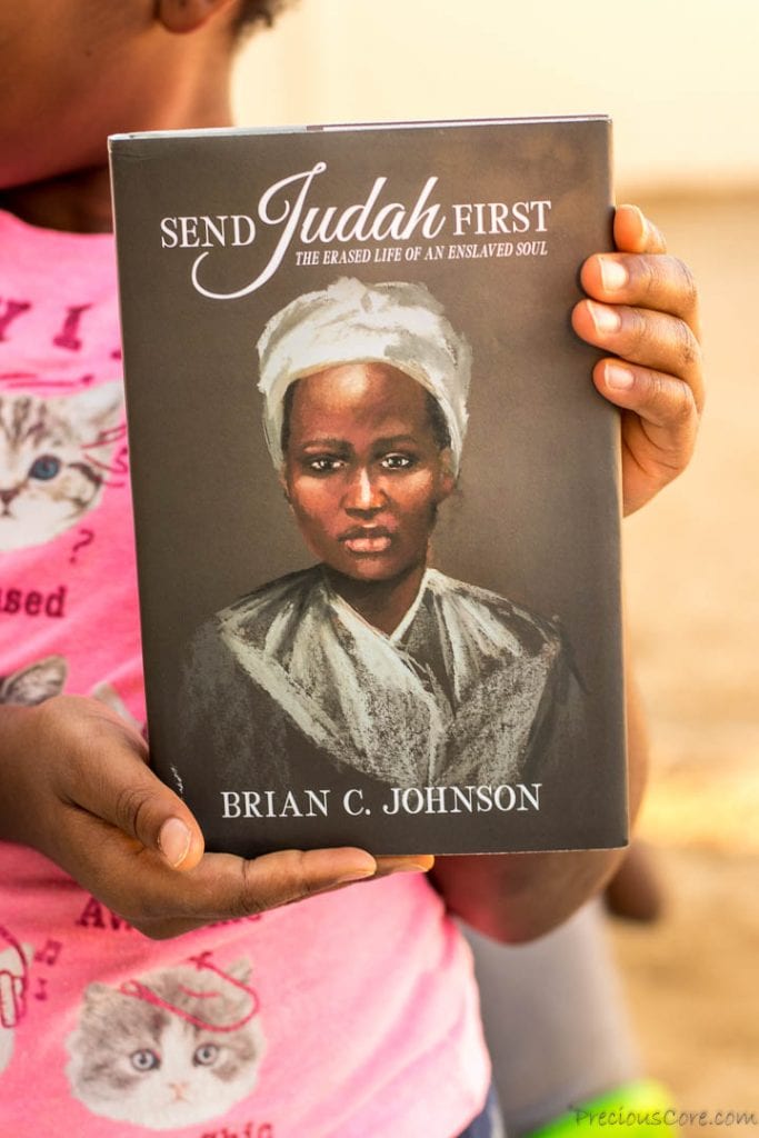 Hands holding Send Judah First Book