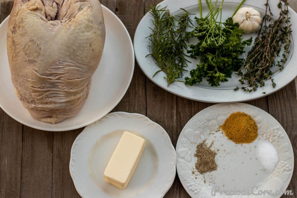 Raw turkey breast with herbs
