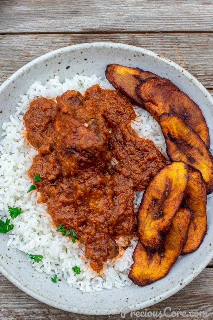 Bowl of African chicken stew on Rice