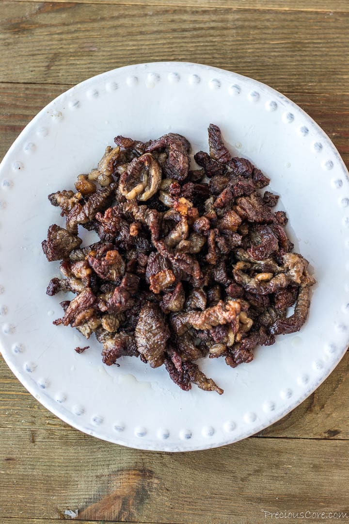 Browned beef on a plate.