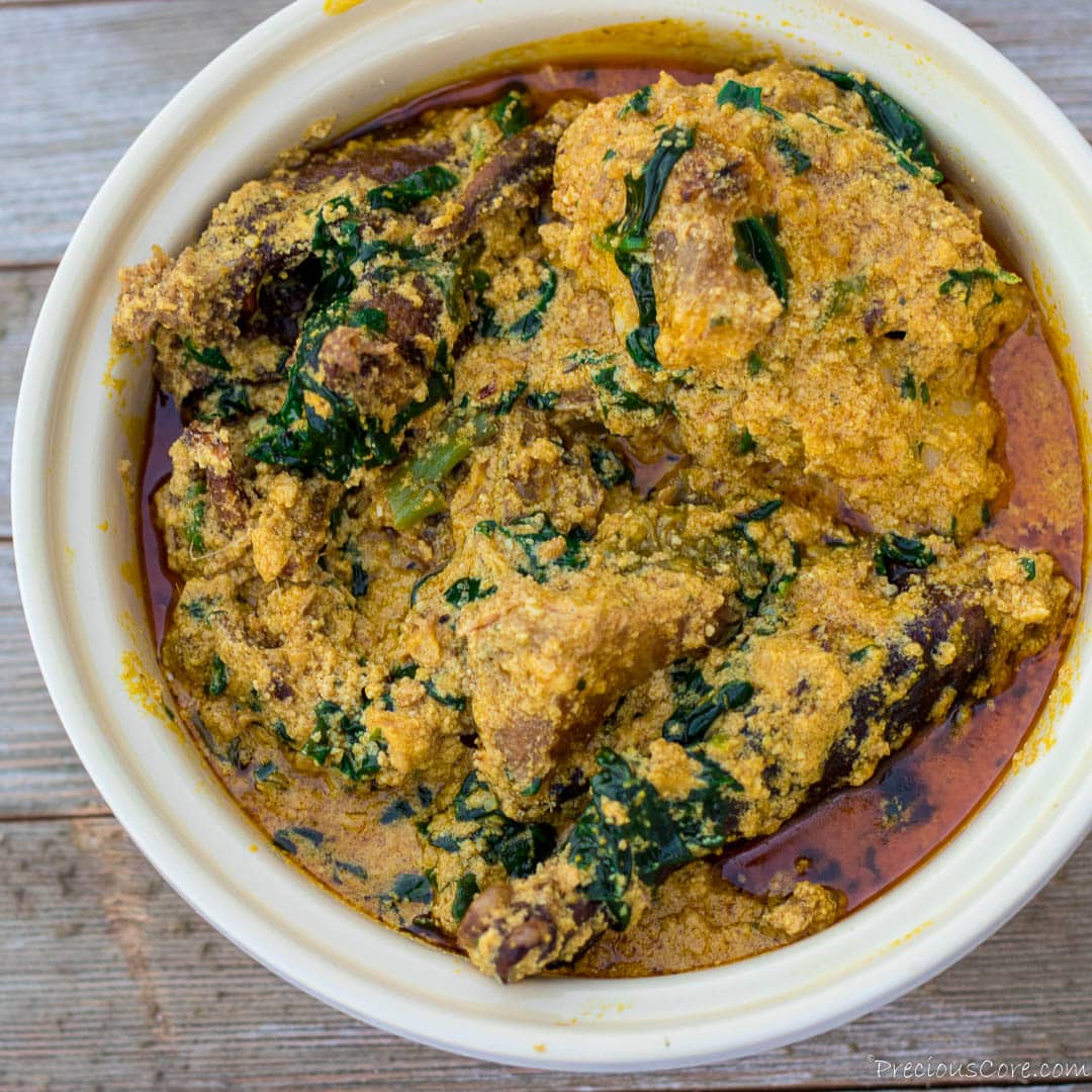 Nigerian Egusi Soup in a round white bowl.