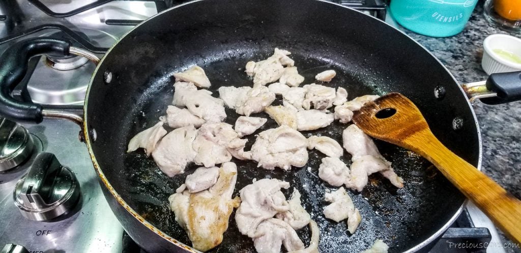 Cooking thinly cut chicken breasts in a pan