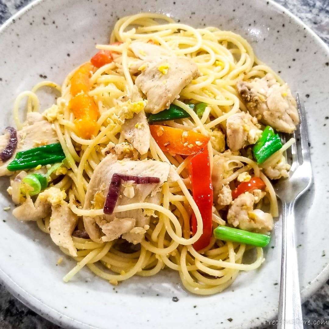 spaghetti stir fry on a plate