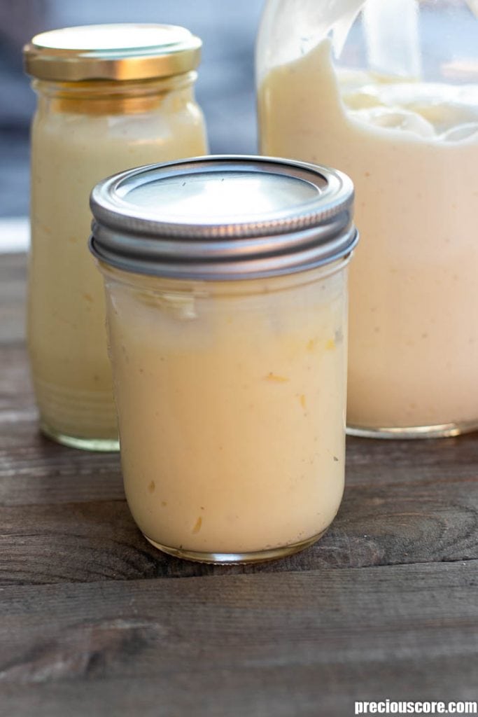 Homemade mayonnaise in jars with tight-fitting lids