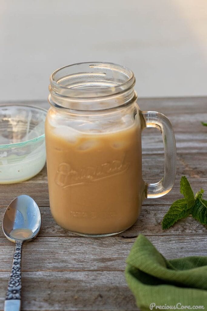 creamy iced coffee in a mason jar