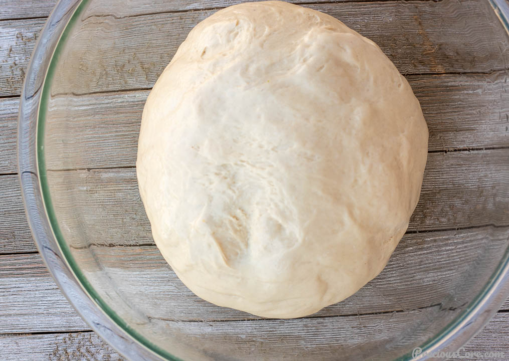 bread dough in a mixing bowl