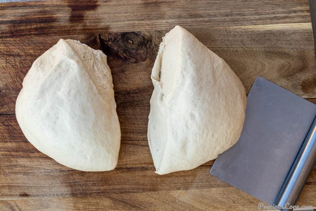 2 portions of dough on a chopping board
