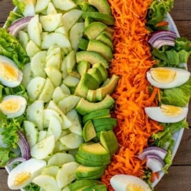 Lettuce, cucumbers and other vegetables on a platter