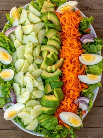 Lettuce, cucumbers and other vegetables on a platter