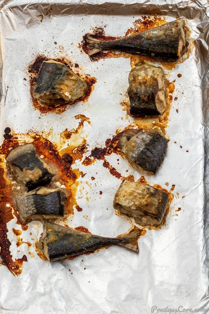 baked fish steaks on a baking sheet