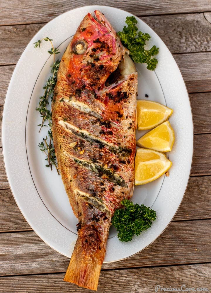 grilled red snapper on a platter