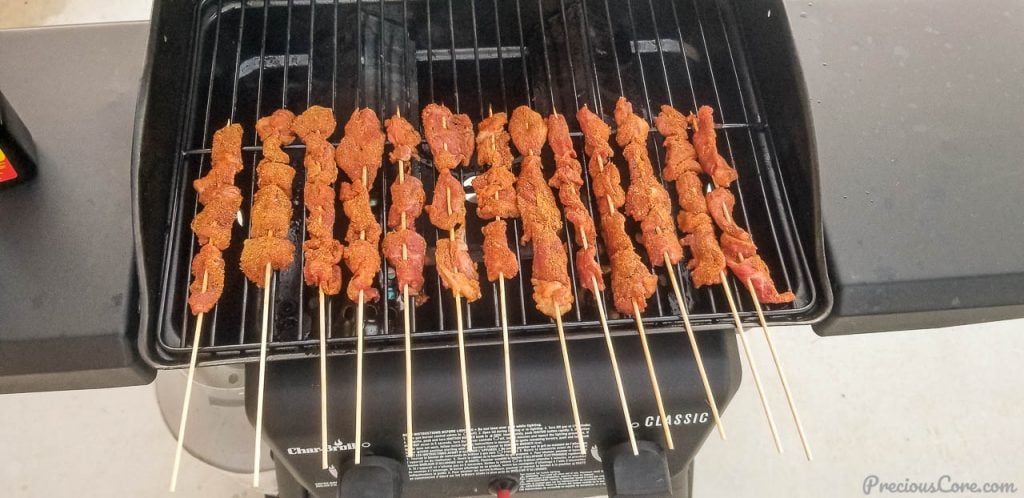 Skewered beef on a grill
