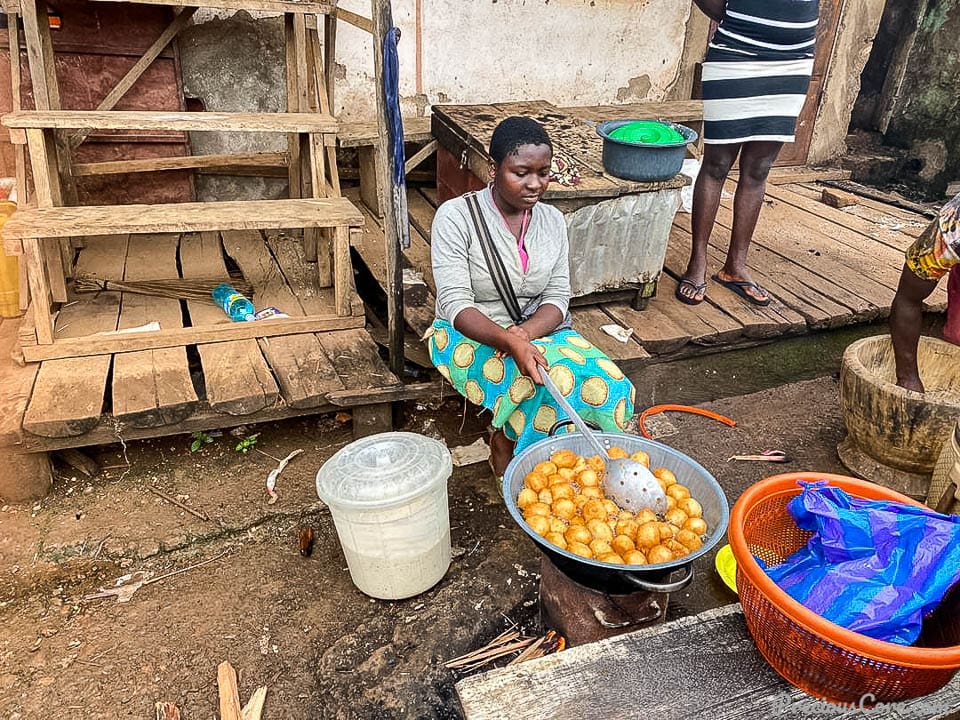 Woman frying Puff Puff 