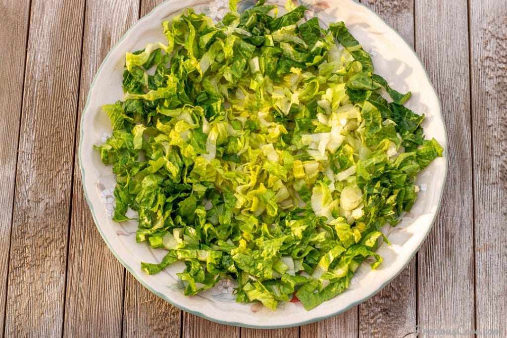 Chopped romaine lettuce on a platter