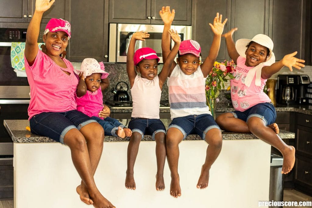 mother and 4 daughters in a kitchen