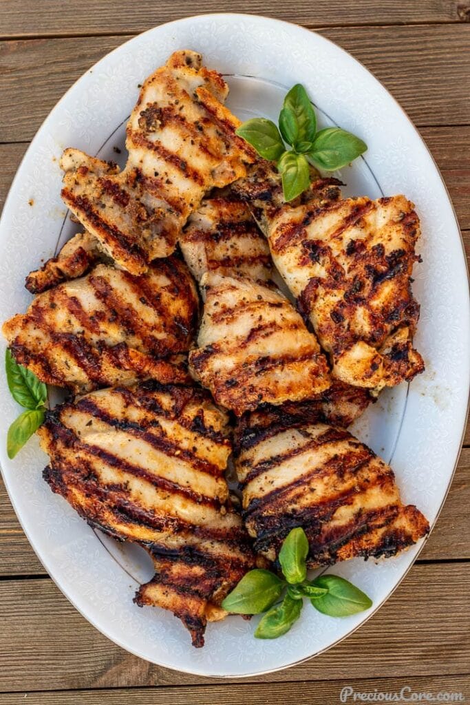 grilled boneless chicken thighs on a platter