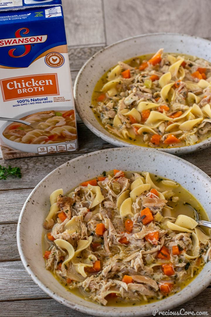 Quick chicken noodle soup in bowls.