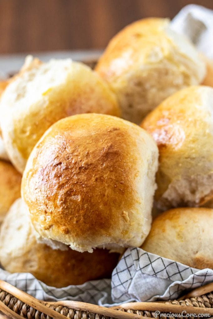 close up of a dinner roll in a basket