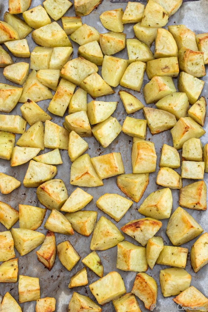 easy roasted potatoes on baking sheet lined with parchment paper