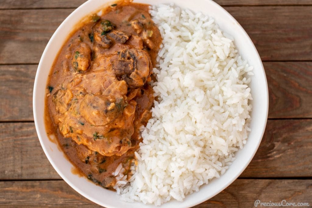 landscape picture of chicken peanut stew and rice