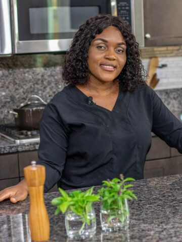 Lady standing in Kitchen