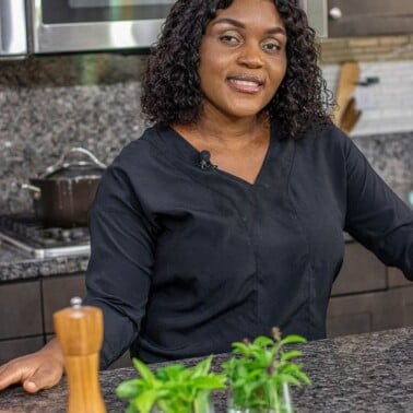 Lady standing in Kitchen