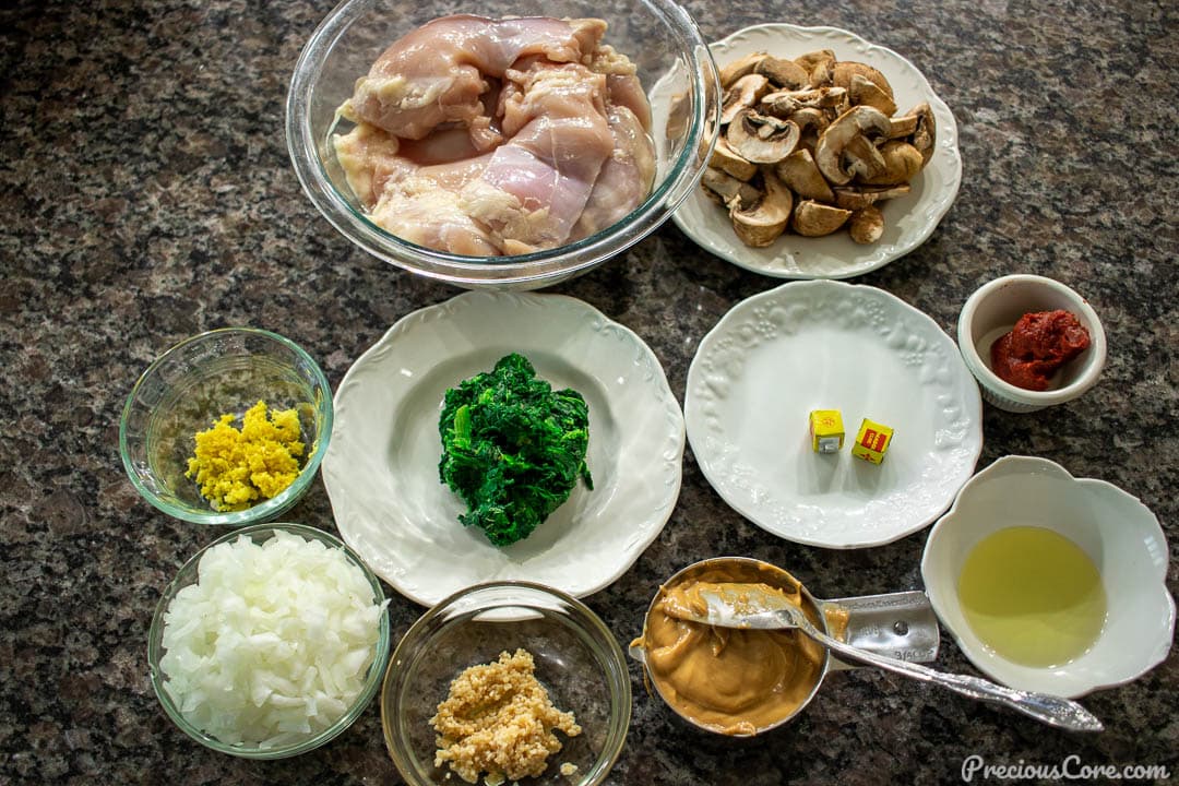 Ingredients needed for easy African chicken peanut stew on a countertop.