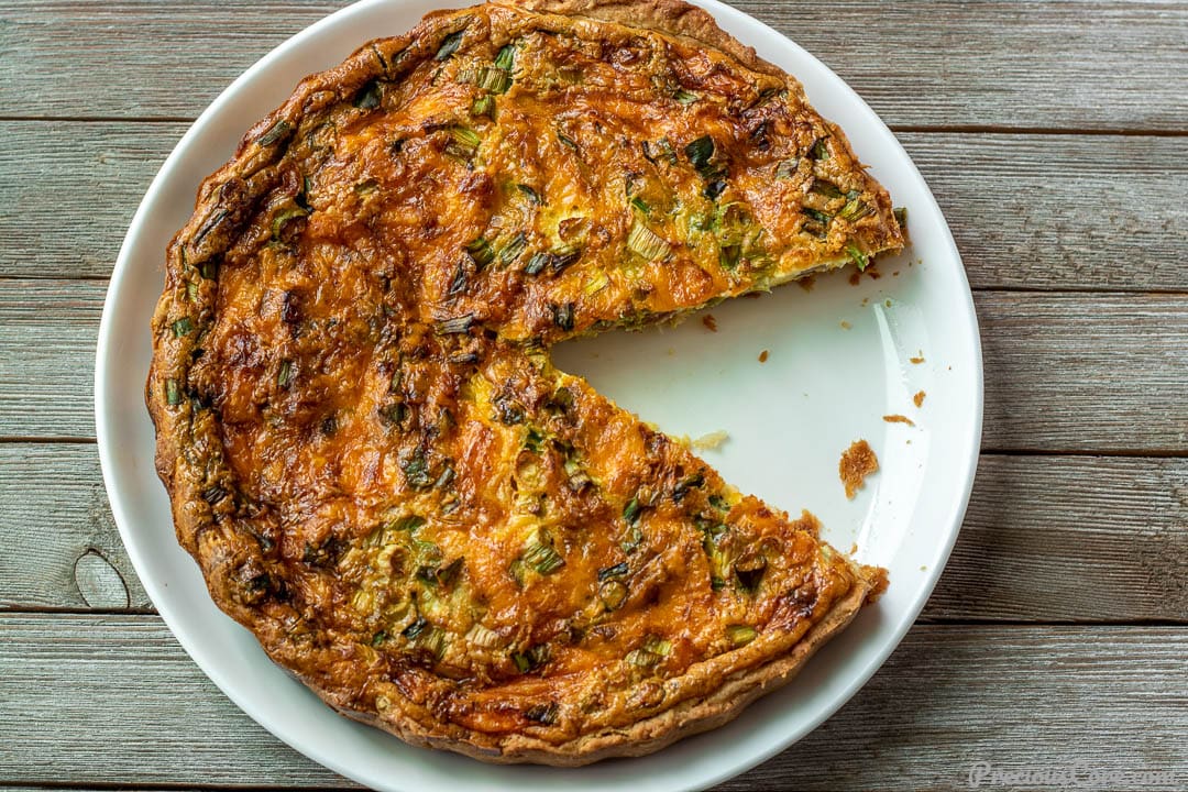 Quiche with a slice cut out