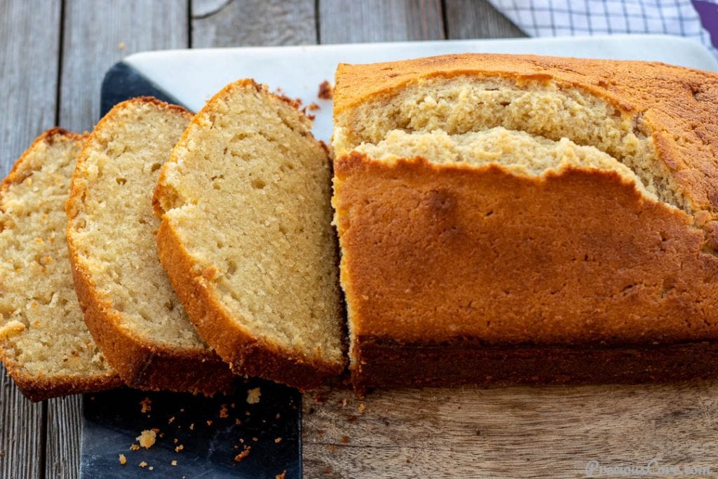 Pound Cake on cutting board with some slices.