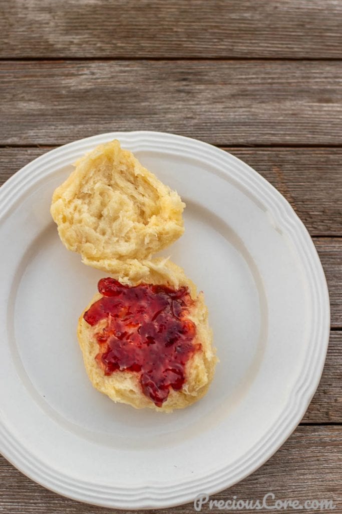 1 BISCUIT ON A PLATE WITH JAM SPREAD ON TOP