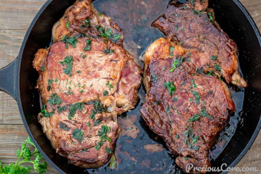 Pan seared ribeye steak in cast iron skillet