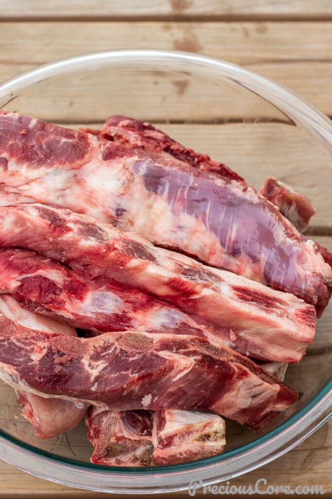 A bowl of raw spare ribs
