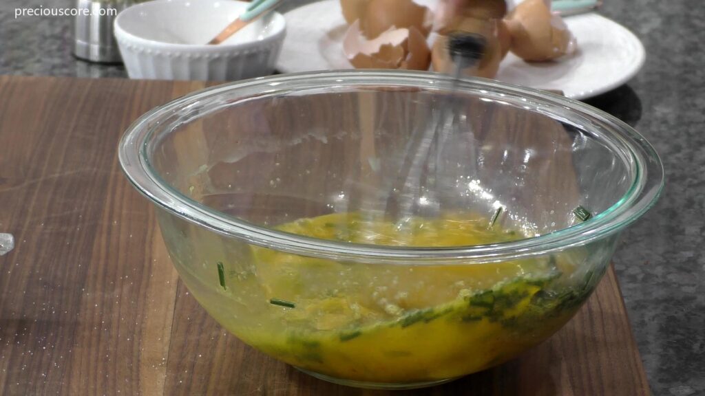 Egg mixture for frittata in bowl
