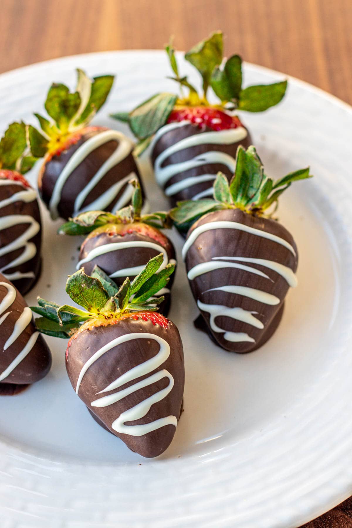chocolate covered strawberries drizzled with white chocolate