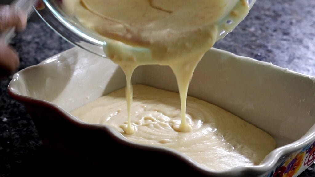 pouring batter into baking dish