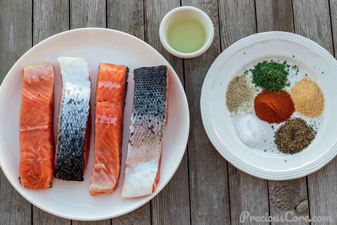 Salmon, oil and dry rub spices for pan grilled salmon