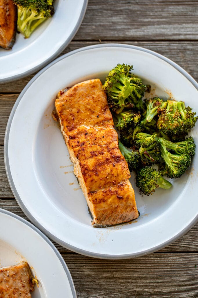 Plate of salmon and broccoli from a sheet pan