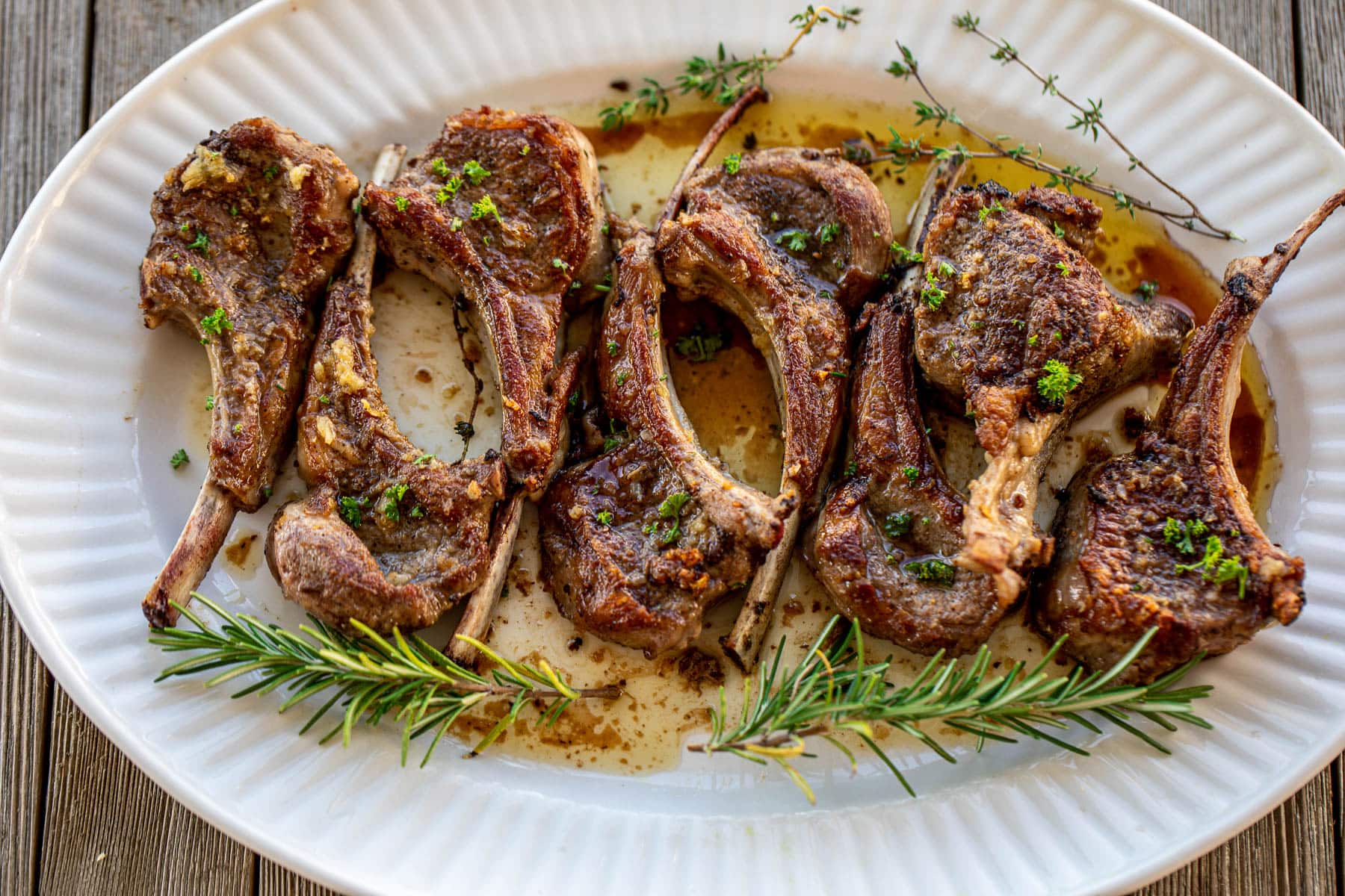 Pan Seared Lamb Chops Garnished with fresh parsley