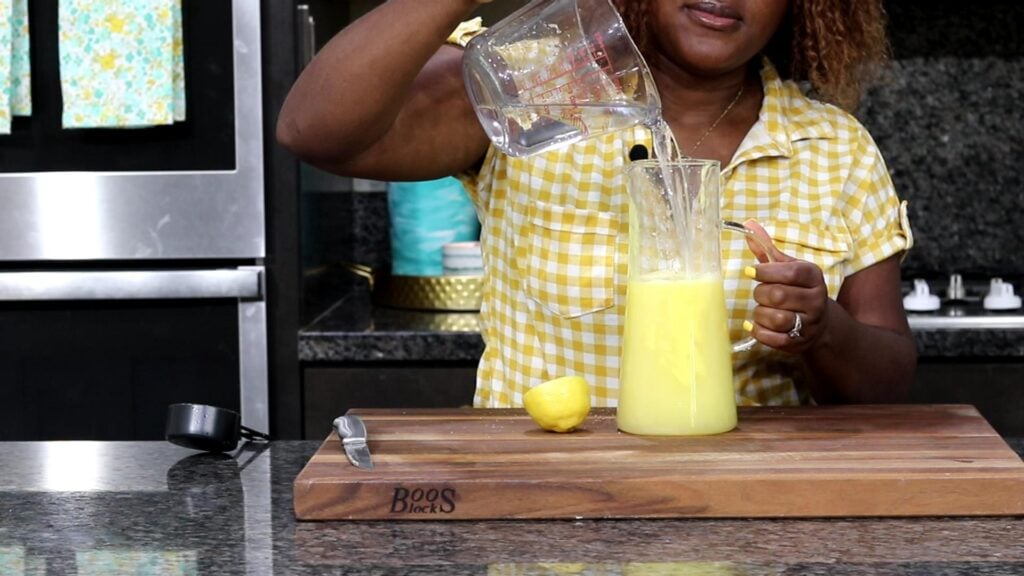 Adding water into a pitcher