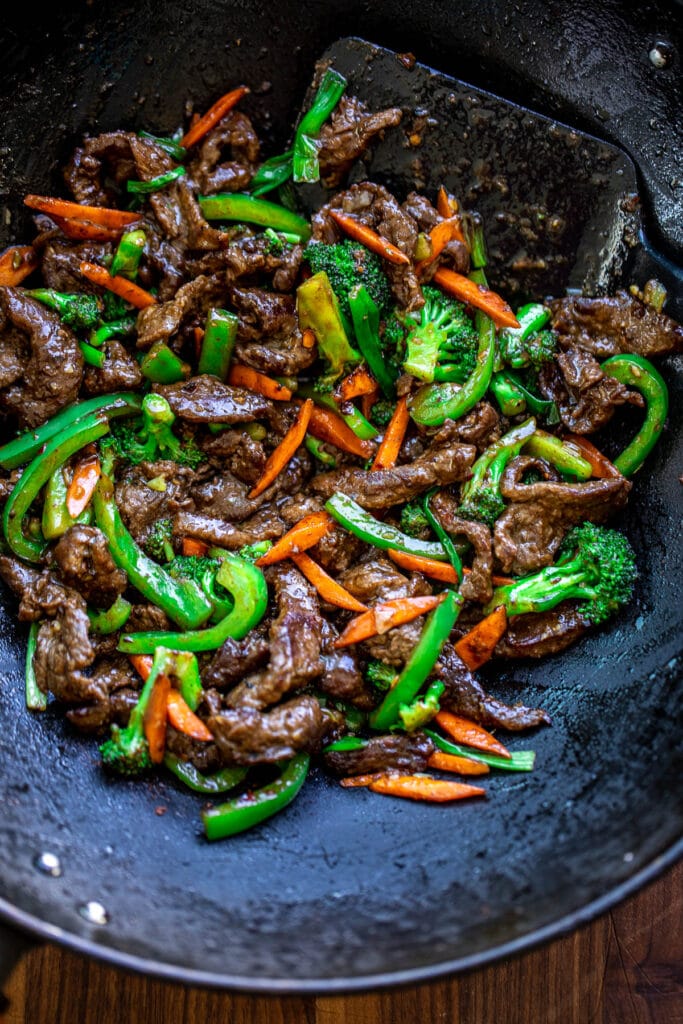 Beef and vegetable stir fry in wok