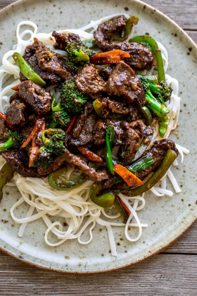 Beef stir fry over noodles