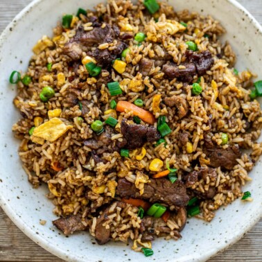 A serving of fried rice in a bowl.