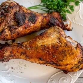 Two Turkey Drumsticks on a plate