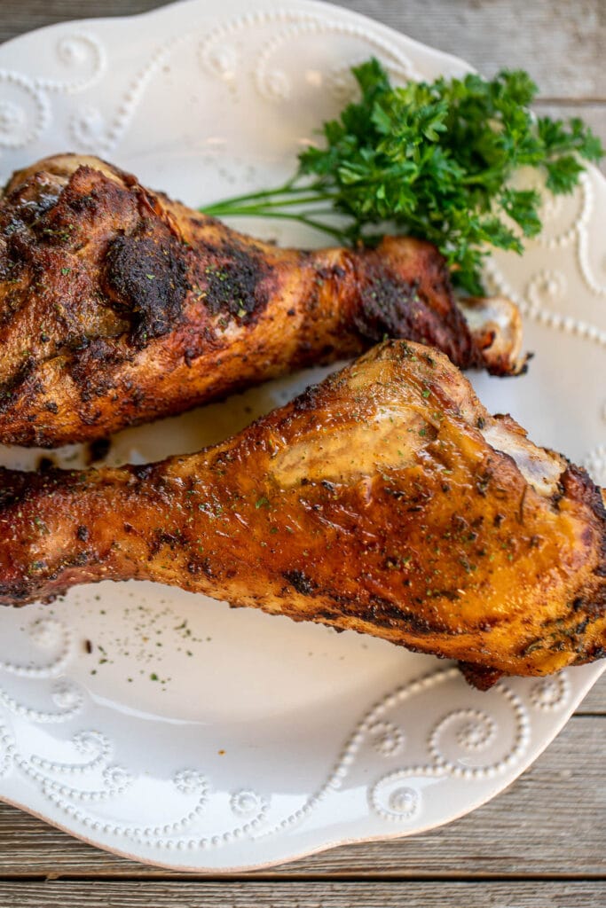 Two Turkey Drumsticks on a plate