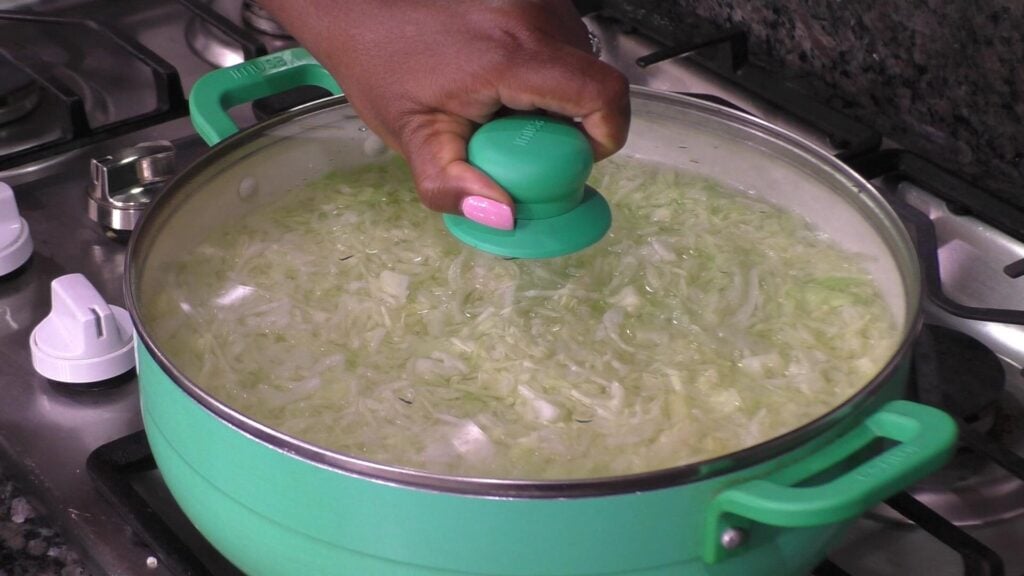 Shredded cabbage in a pot of water