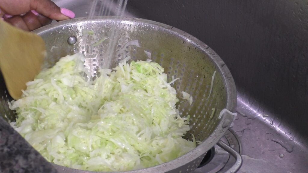 Cabbage rinsing in colander