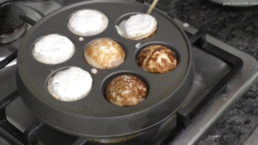 Cooking rice pancakes on Aebleskiver pan