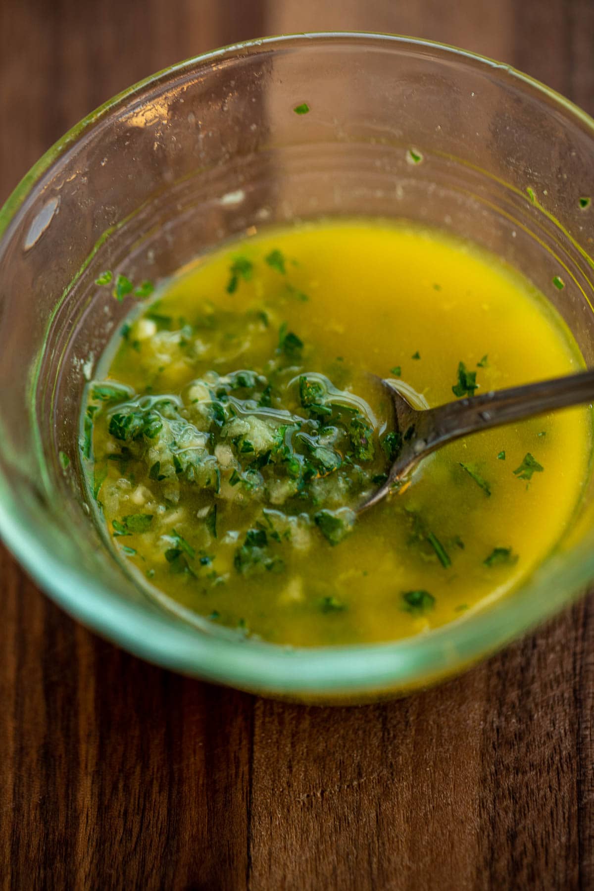 Ingredients for Garlic Butter mixed in a bowl